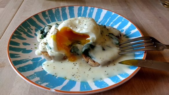 Poached egg with greens